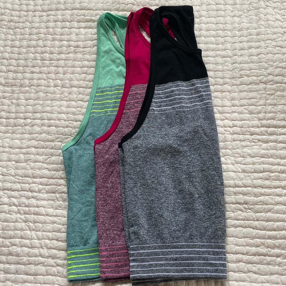 3 Nike Dri-Fit training tanks